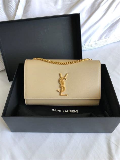 ysl kate clutch powder|farfetch ysl clutch.